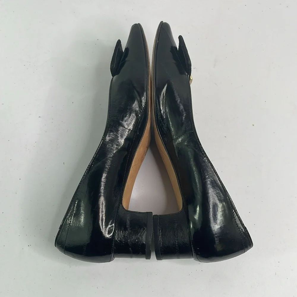 Vaneli black eel skin? Pumps w rounded square toe. Suede and gold buckle detail.